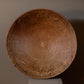 Large terracotta serving dish with foot