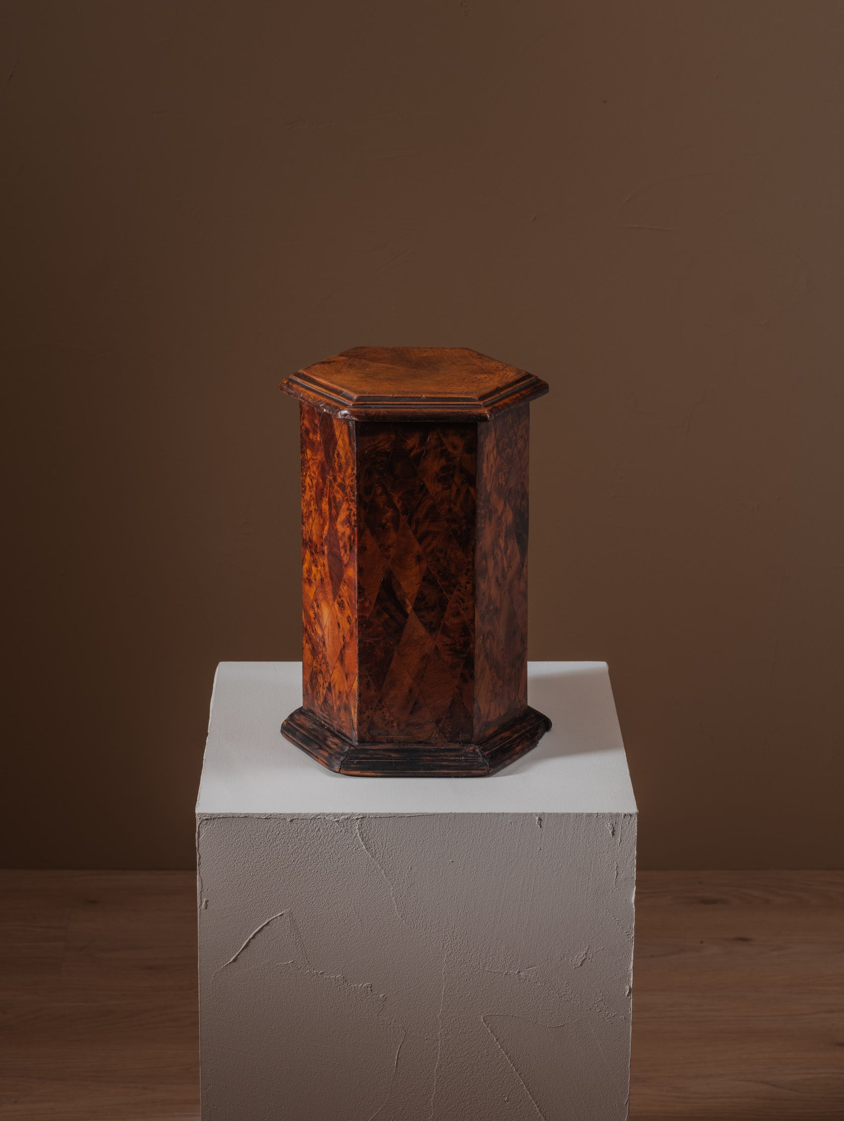 Small vintage hexagonal plinth in thuya burl wood
