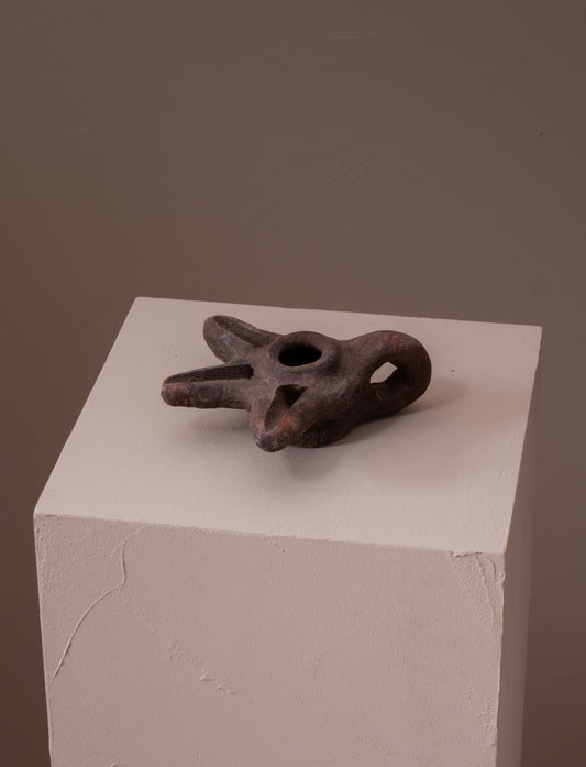 Terracotta oil lamp with three spouts